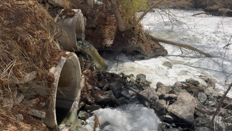 River turbulence can push toxic pollutants into the air River water is shown rapidly flowing through concrete culverts, creating foam in the Tijuana River. The water appears brownish black because it is contaminated with untreated sewage.