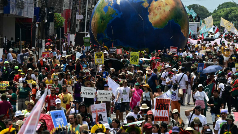 Here are 3 big ideas to combat climate change, with or without COP Protestors march outside of COP30 in Brazil