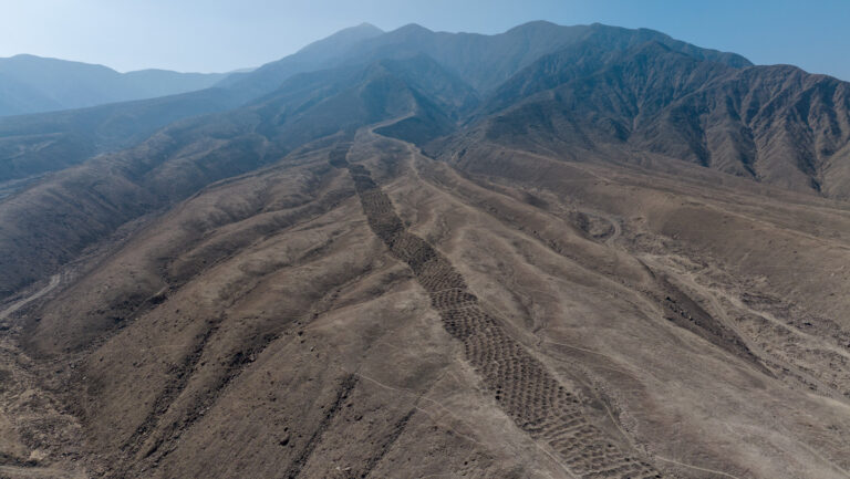 Peru’s Serpent Mountain sheds its mysterious past This aerial view of the brown foothills of the Andes shows a ridgetop series of earthen holes, part of an ancient mysterious monument that stretches 1.5 kilometers.